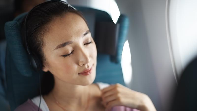 Women relaxing in aircraft cabin