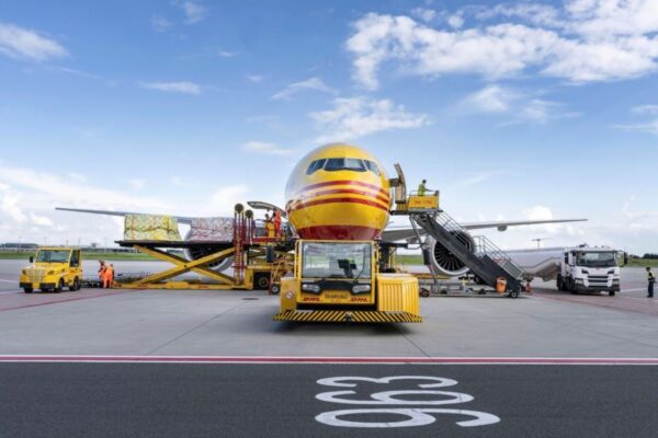 DHL Express has announced that one in three of its tractors and loaders, which sort and transport time-critical shipments from Brussels Airport, will be fully electric this summer.