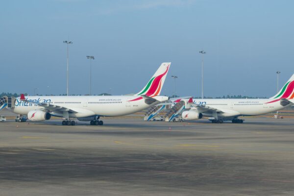 Two SriLankan Airlines Airbus A330s on the airfield of Bandaranaike International Airport.