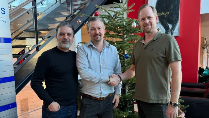 Wallenborn’s Deep Sagoo and Peter Nygaard with WFS' Jimi Daniel Hansen.