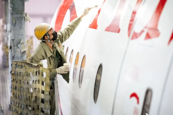Austrian Airlines aircraft being equipped with AeroSHARK surface technology.