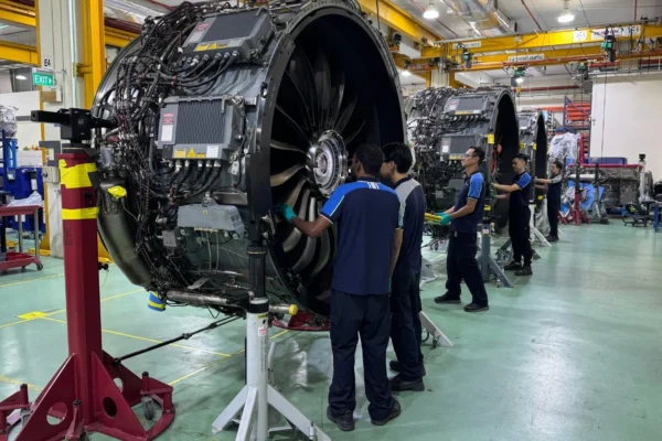 Technicians working on LEAP-1A engines at ST Engineering's facility in Singapore