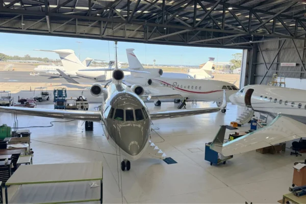 ExecuJet MRO Services Australasia has reached a new operational milestone, with three Dassault Falcon aircraft undergoing heavy maintenance checks concurrently at its Sydney Airport facility - the first time the company has handled such volume simultaneously.