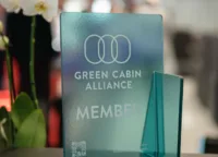 green cabin member plaque