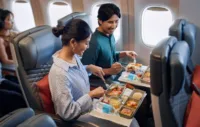 Promotional shot of a happy couple enjoying the new SIA Premium Economy experience (Pic: Singapore Airlines)