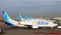 FlyDubai aircraft lined up on the airport ramp.