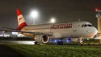 Austrian Airlines Airbus A320 departs the Airbourne Colours hangar at East Midlands Airport following a full livery repaint.