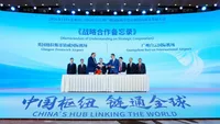 Matteoni (left) signs MoU with representatives from Guangzhou Baiyun International Airport.