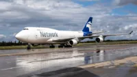 A Network Airline Management B747-400BCF aircraft taxiing on the ground in Liege.