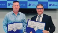 (L-R) Virgil Pizer, chief executive of Pem-Air, and Manoj Kumar Singh, chief customer officer - aviation, aerospace and defence at Ramco Systems, during the signing ceremony held at Pem-Air’s office in Brooksville.
