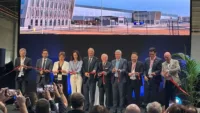 Senior representatives of Aéroports de Lyon, WFS, Prologis, and em2c Group performing the official opening ceremony of the new Aéroport de Lyon DC1 airfreight hub.