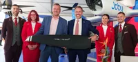 JoeBen Bevirt, CEO of Joby Aviation, and Corneel Koster, CEO of Virgin Atlantic, sign a definitive agreement at the Farnborough Air Show on July 22, 2026 (Credit: Joby Aviation)
