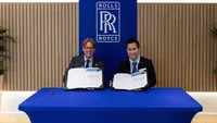 Rob Watson, president of civil aerospace, Rolls-Royce (left) and Lucio C. Tan III, president and chief operating officer of PAL Holdings, Inc. (right) during the signing of agreement between Philippine Airlines and Rolls-Royce, supporting the airline's future Airbus A350-1000 operations. Credit: Rolls-Royce
